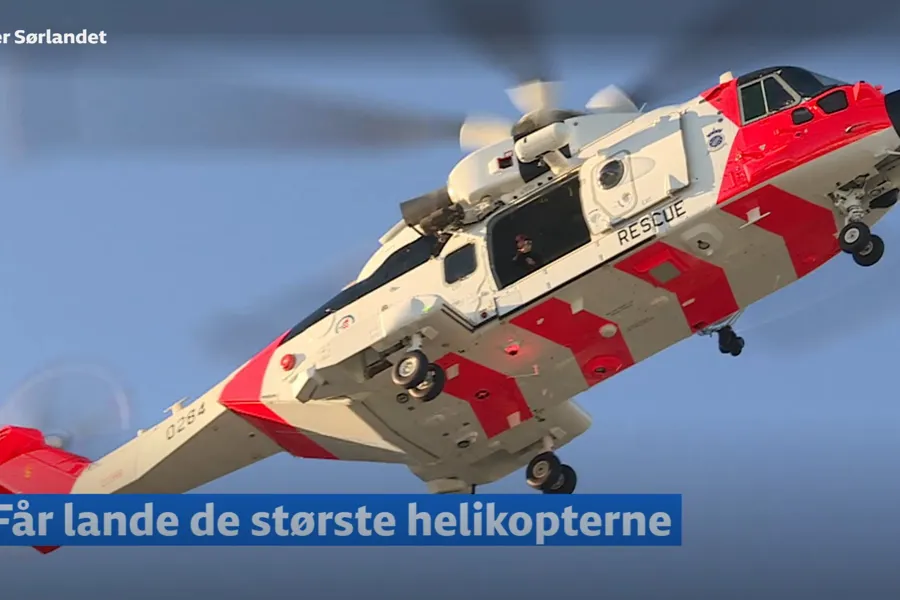 Et rødt og hvitt fly